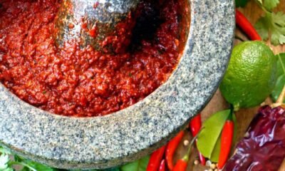 A stone bowl of homemade Indian curry paste