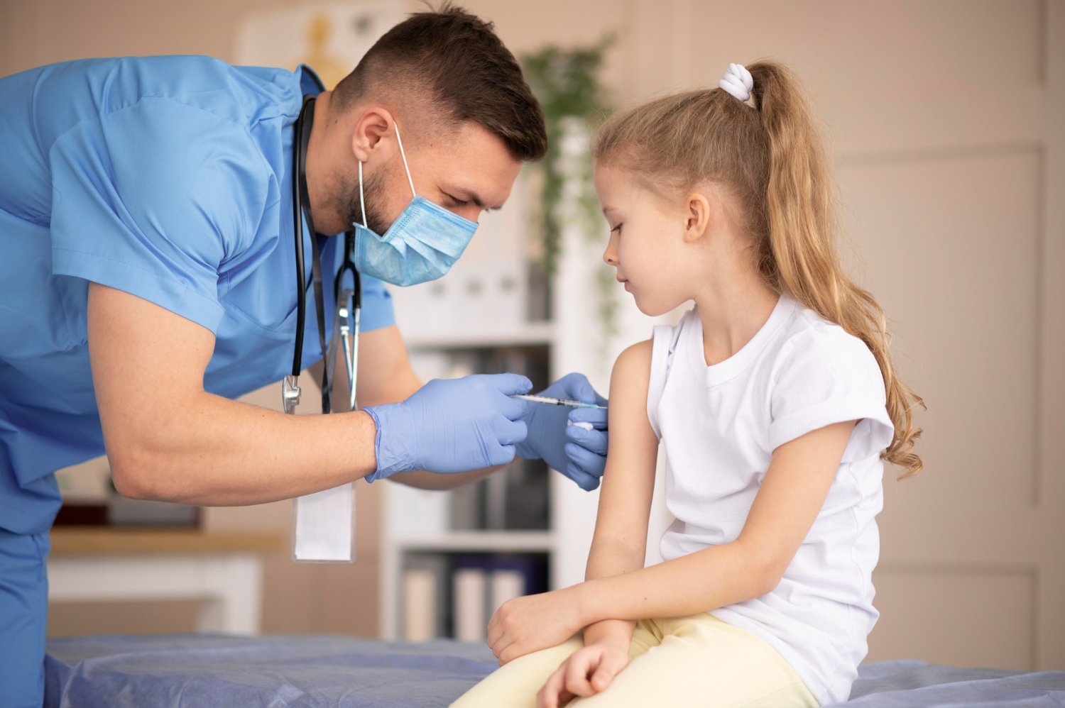 a doctor performing Vaccination Programme