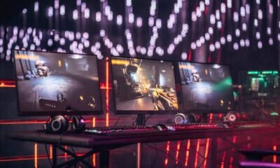 Interior of a gaming room lit with neon lights