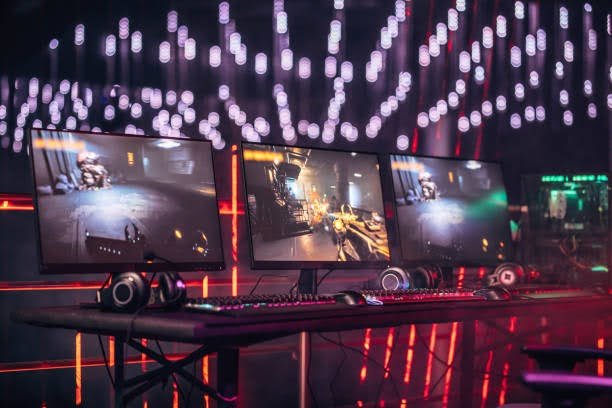 Interior of a gaming room lit with neon lights